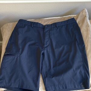 Greg Norman golf shorts
Size 36,Blue, extra pocket on one side